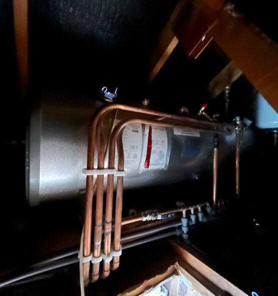 Boiler and copper heating pipework installation